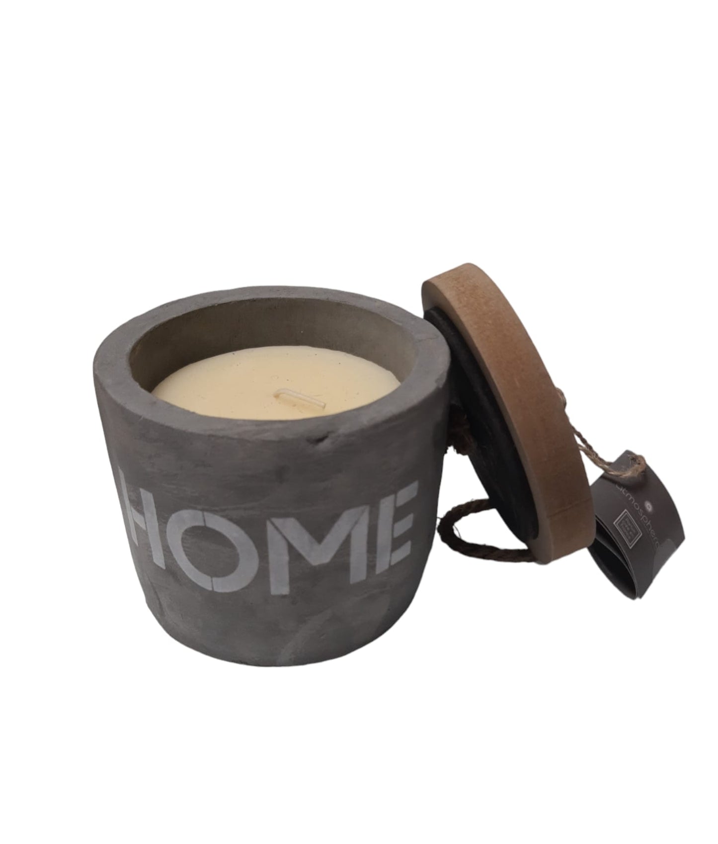 Candela di cera bianca in vaso di cemento grigio home con coperchio in legno