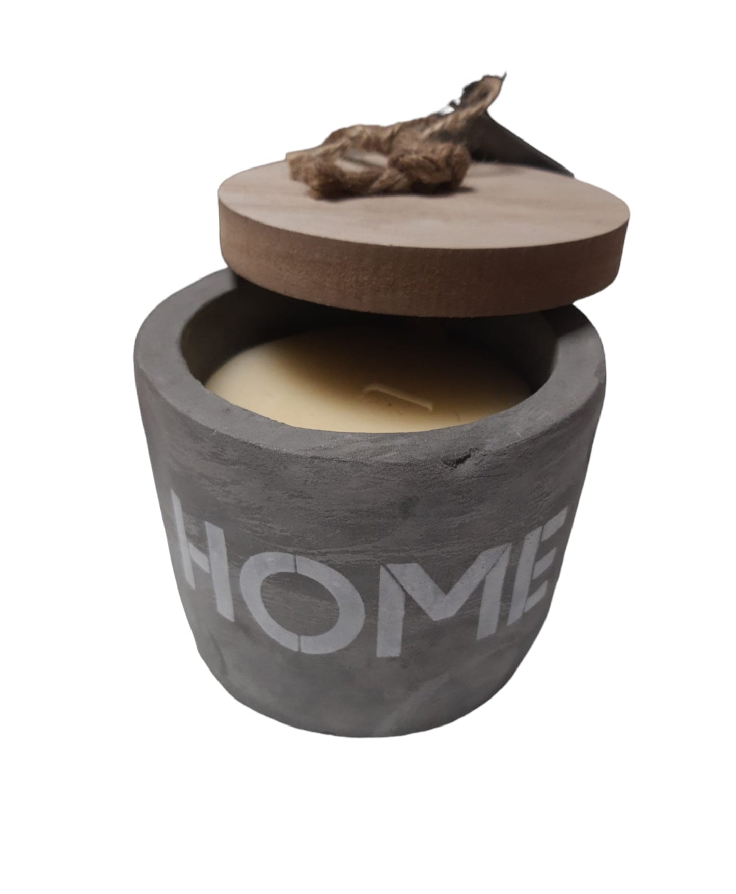Candela di cera bianca in vaso di cemento grigio home con coperchio in legno